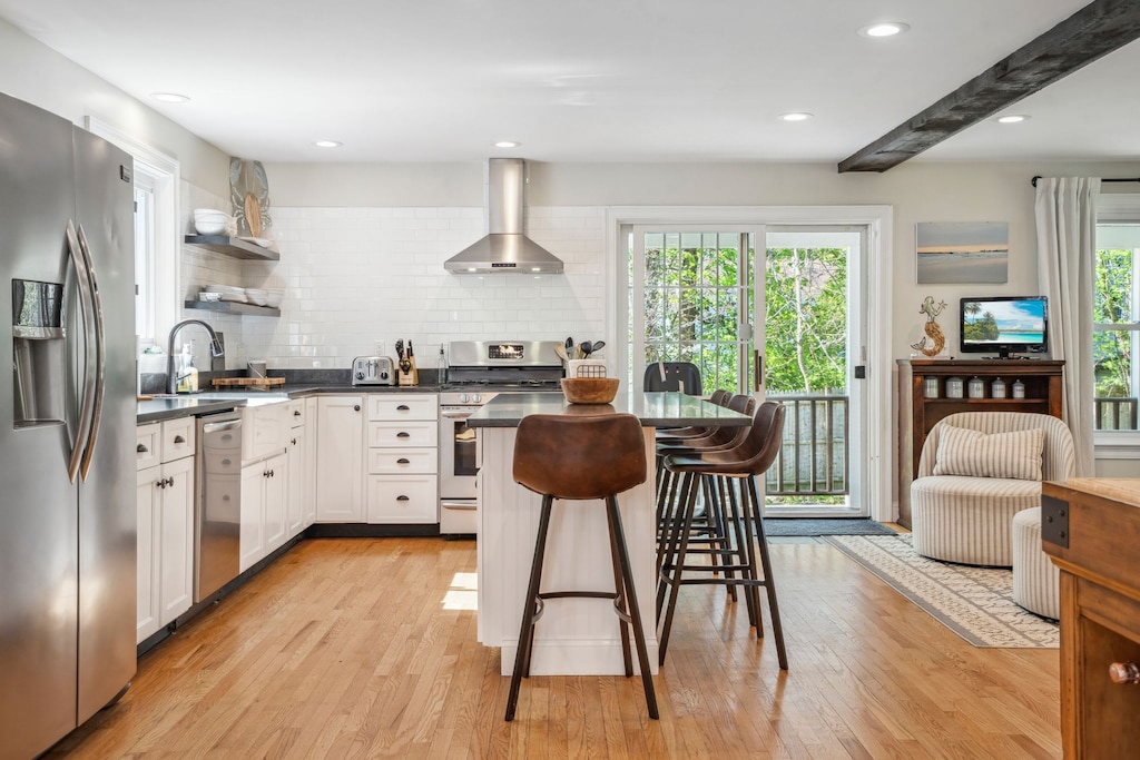 Fully equipped kitchen with dishwasher! This space is perfect for family gatherings. High chair is located in the kitchen. 