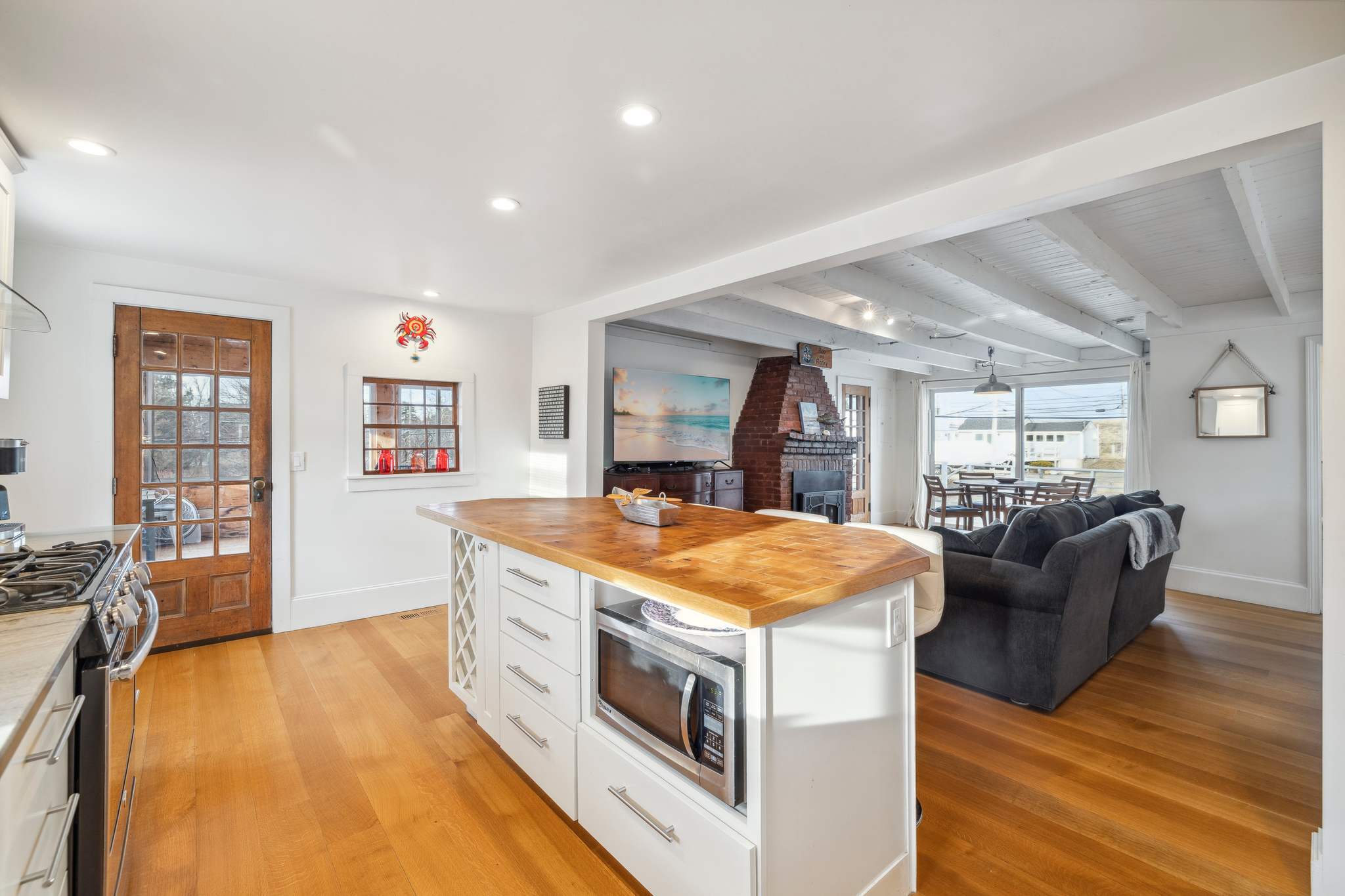 The fully equipped kitchen! This kitchen features a gas stove, seating for 4 at the island, a dishwasher and provided coffee! The fully equipped kitchen! This kitchen features a gas stove, seating for 4 at the island, a dishwasher and provided coffee!