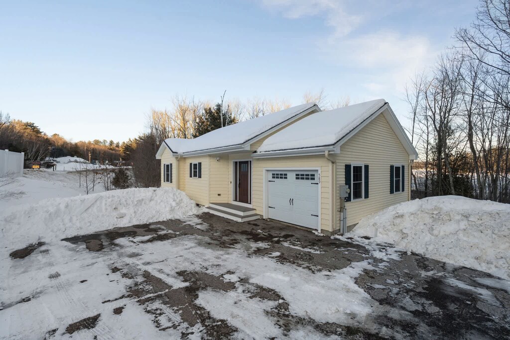 Parking for up to 3 vehicles. The driveway is steep so please be careful in the winter. Four wheel drive is necessary if there is snow. Please no parking in the garage