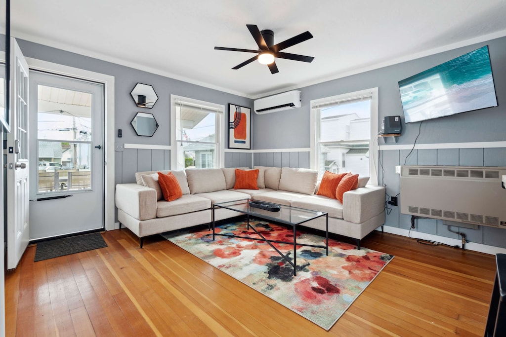 Relaxing lounge area with an inviting sofa and smart TV!