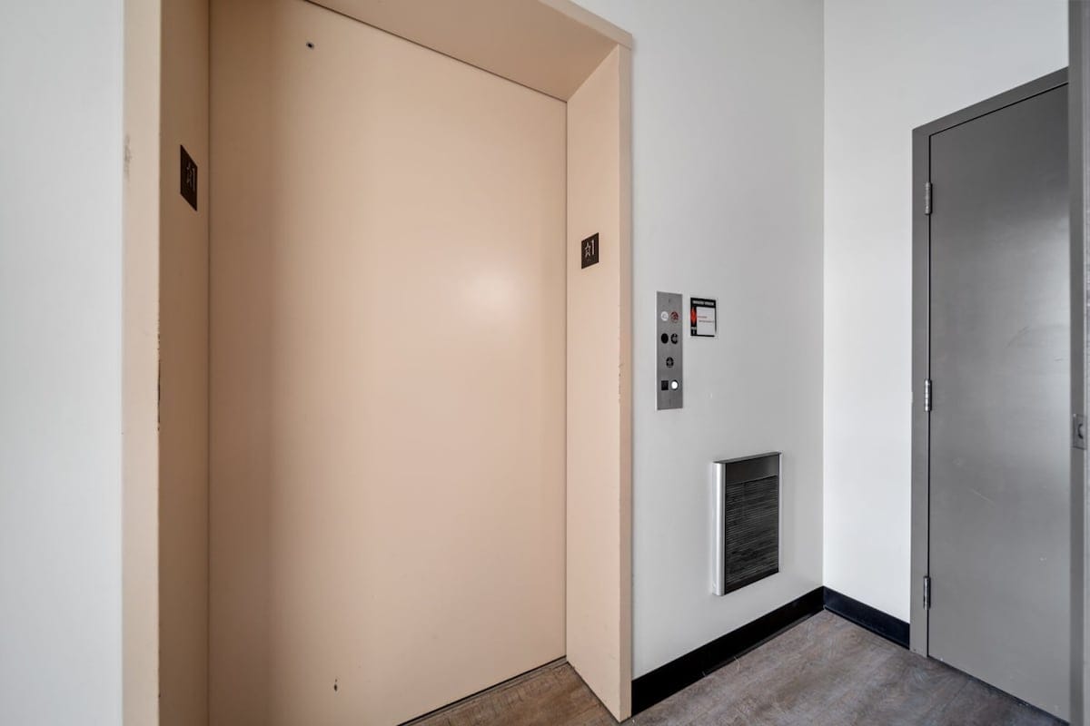 Elevator on ground level to our front entrance in the common courtyard