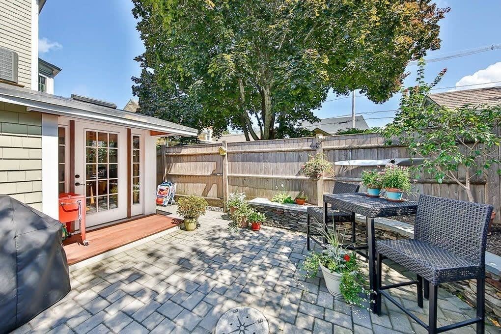Private back patio with gas grill