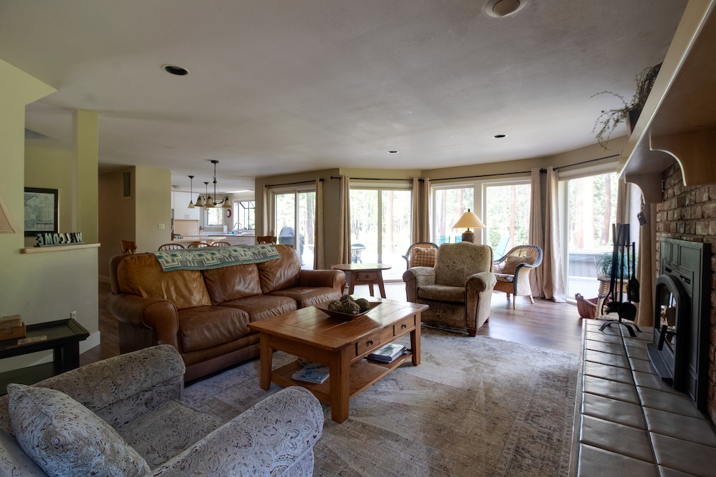 Living Room: Sun-soaked space with rustic charm