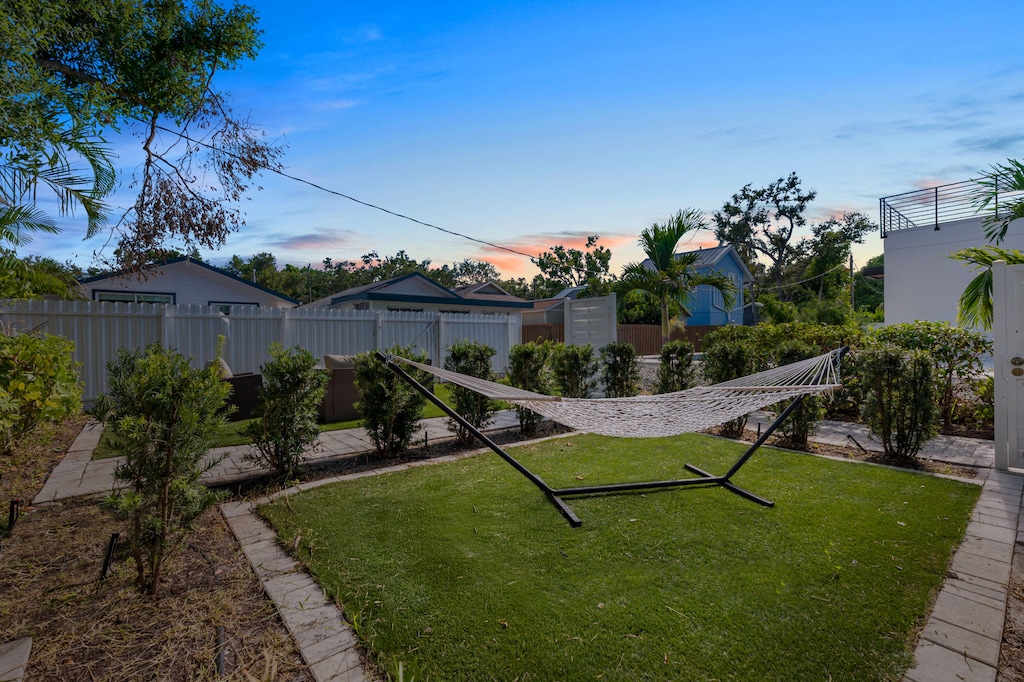 Escape the everyday and enter your own personal oasis! Picture yourself swaying gently in that hammock as the sun dips below the horizon, painting the sky in breathtaking hues. Instant relaxation guaranteed. 