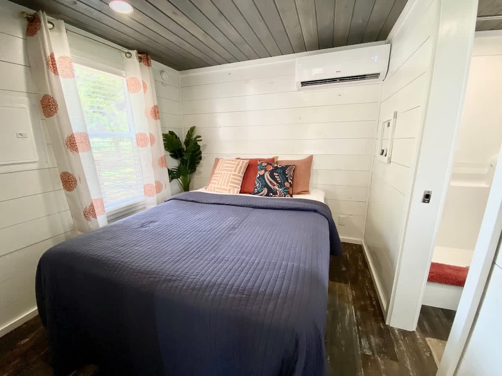 Comfy queen bed for a peaceful night's sleep after a long day of exploring the riverfront property, enjoying our tasting room, and indulging in our exceptional food! 