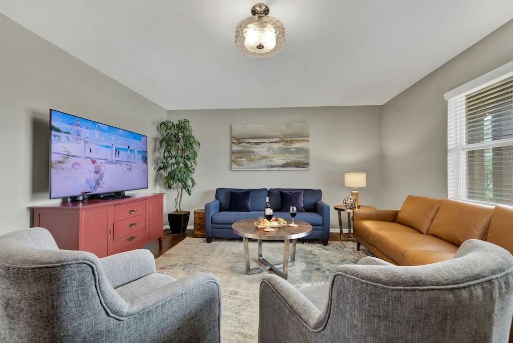 Gather around the large flat screen TV.