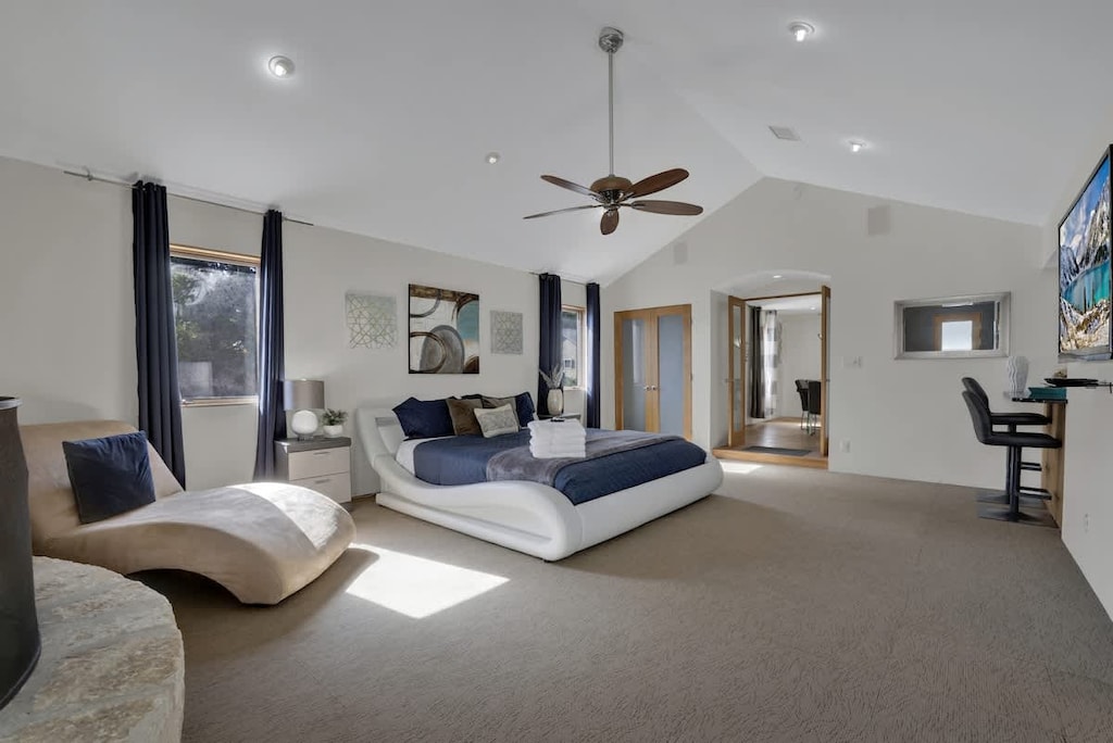 Spacious master bedroom with king sized bed.