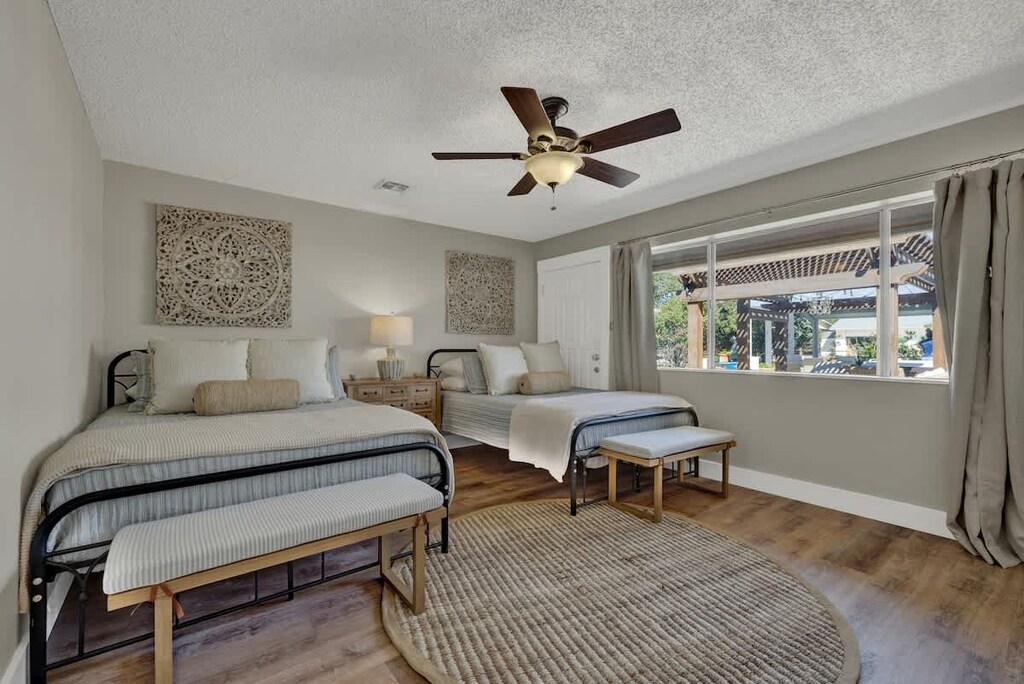 Bedroom three boasts two queen beds.