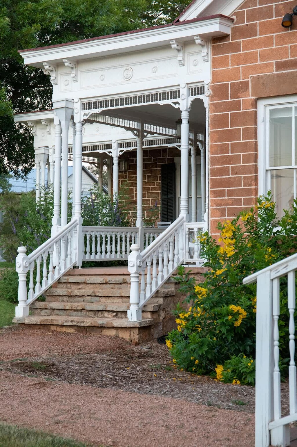 There's just something about wide-open covered porches from a time gone by that calls us to sit back and experience all that life can offer.