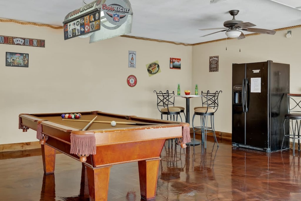 Play a game of pool in the game room.