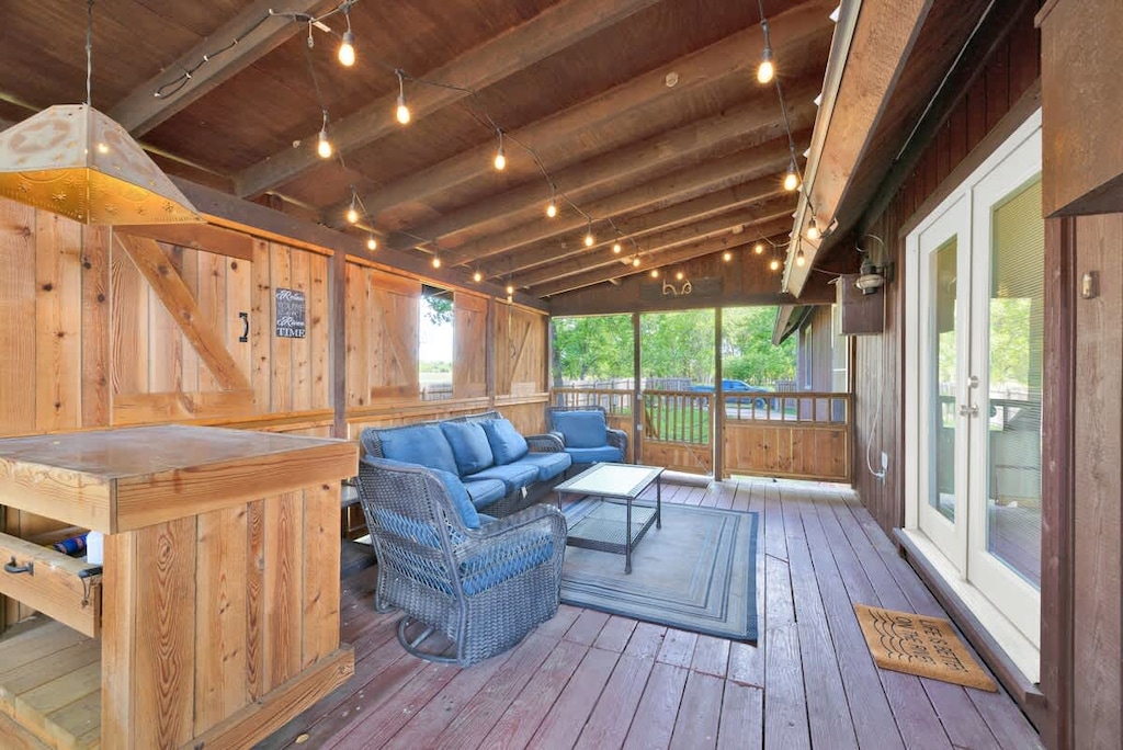 Additional gathering space in the enclosed patio.
