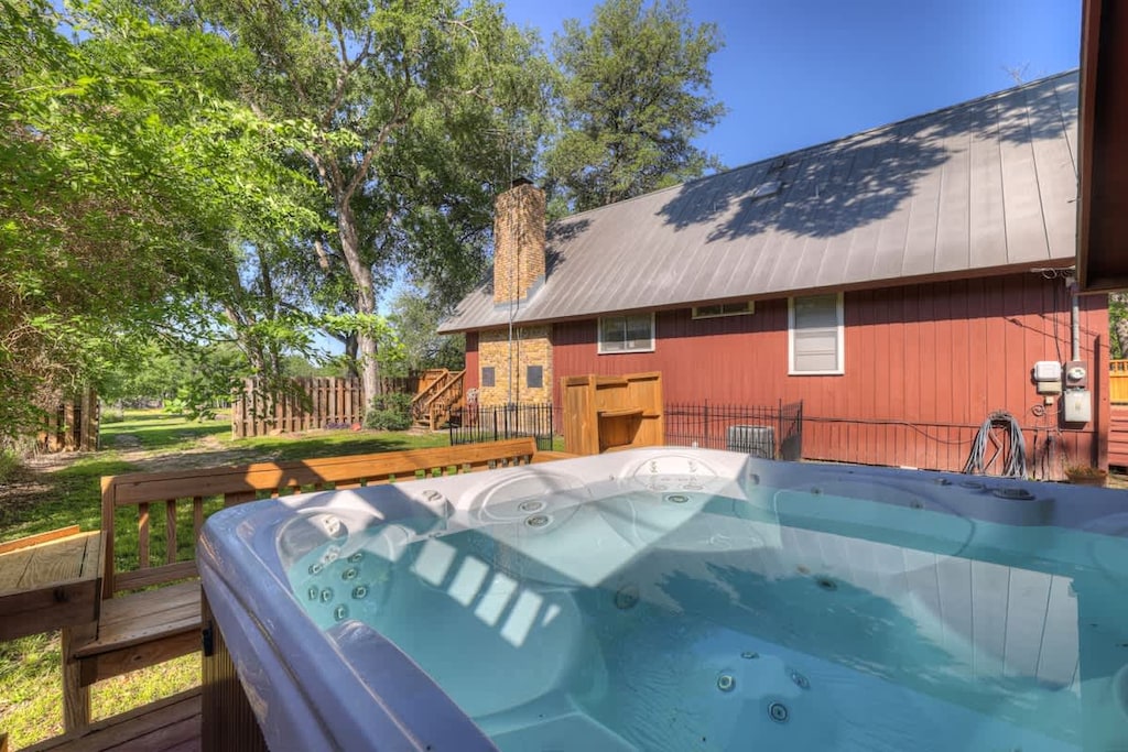 Unwind in the peaceful hot tub that fits six.