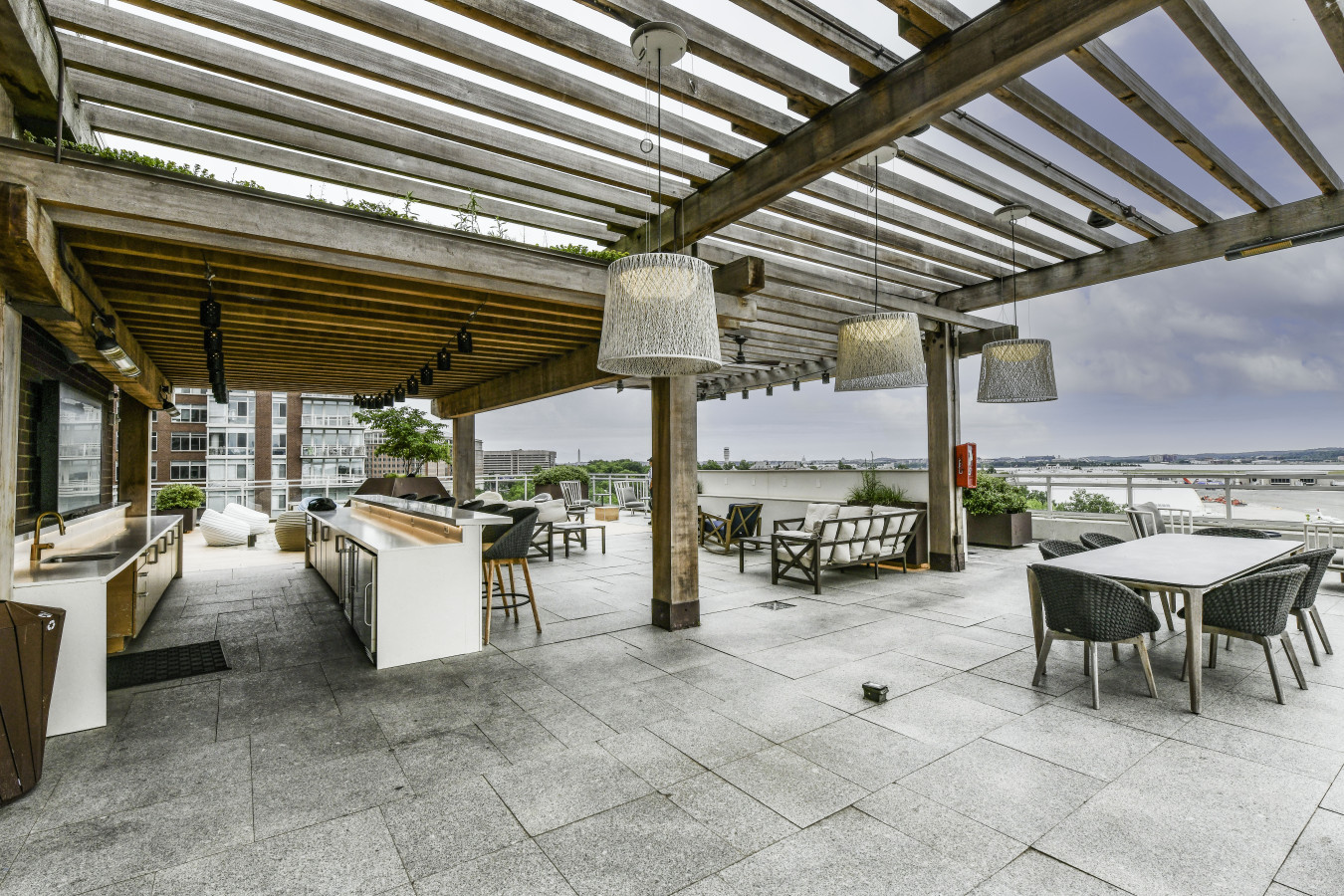 Posh 2BR Retreat | Gym, Prkng & Scenic Rooftop