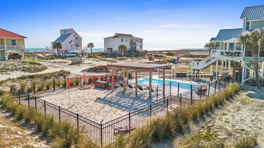 From the pool, volleyball courts straight to the beach just steps away. Your dream vacation is calling!