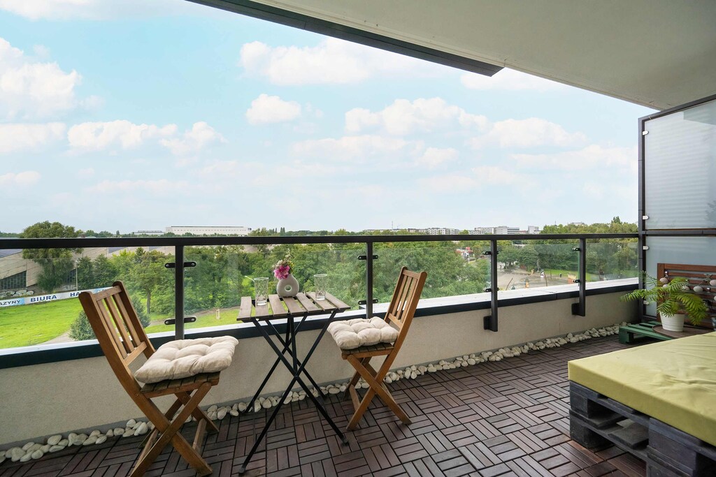 The balcony provides a perfect spot for enjoying the fresh air.