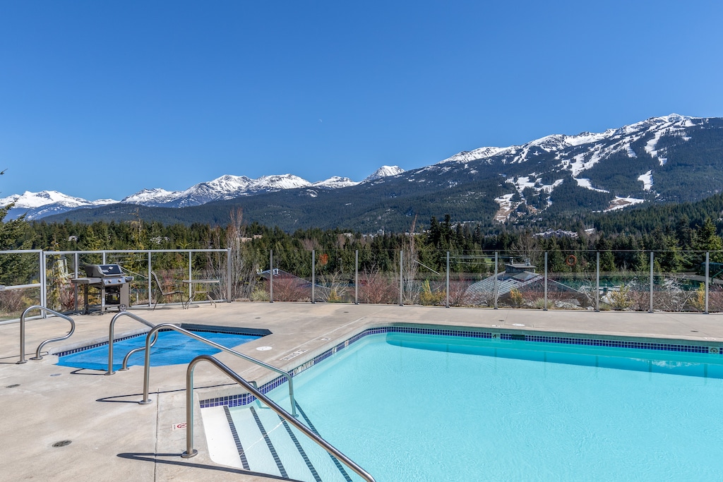 Common Area Hot Tub and Heated Pool- Enjoy expansive mountain and valley views