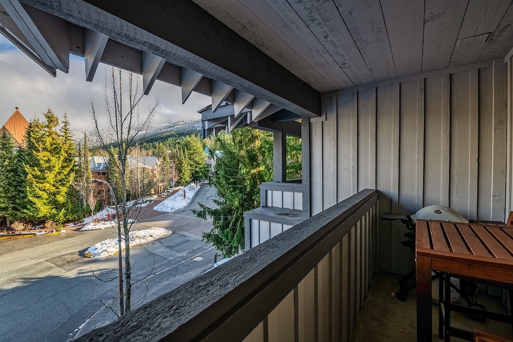 Seating area for two, Weber propane BBQ, beautiful mountain view.