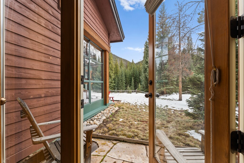 Private entrance and patio for lower level guest bedroom. 