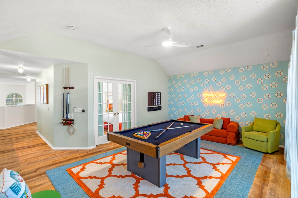 Welcome to your happy place for indoor fun! Our beautifully decorated game room, featuring a fantastic pool table and cheerful decor, is the ultimate hangout spot. Whether you're a pool shark or just looking to relax, this room has you covered!