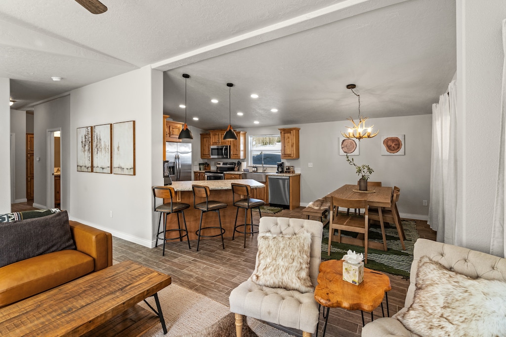 Living Room with Dining room and kitchen in background