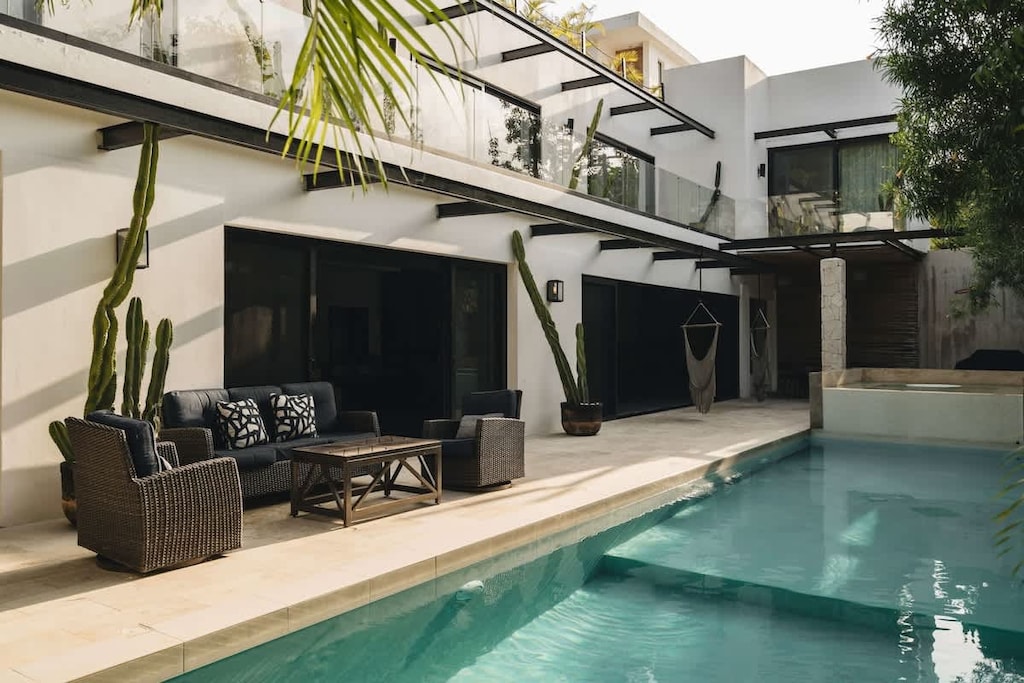 Fantastic patio with a spacious pool and outdoor living area.