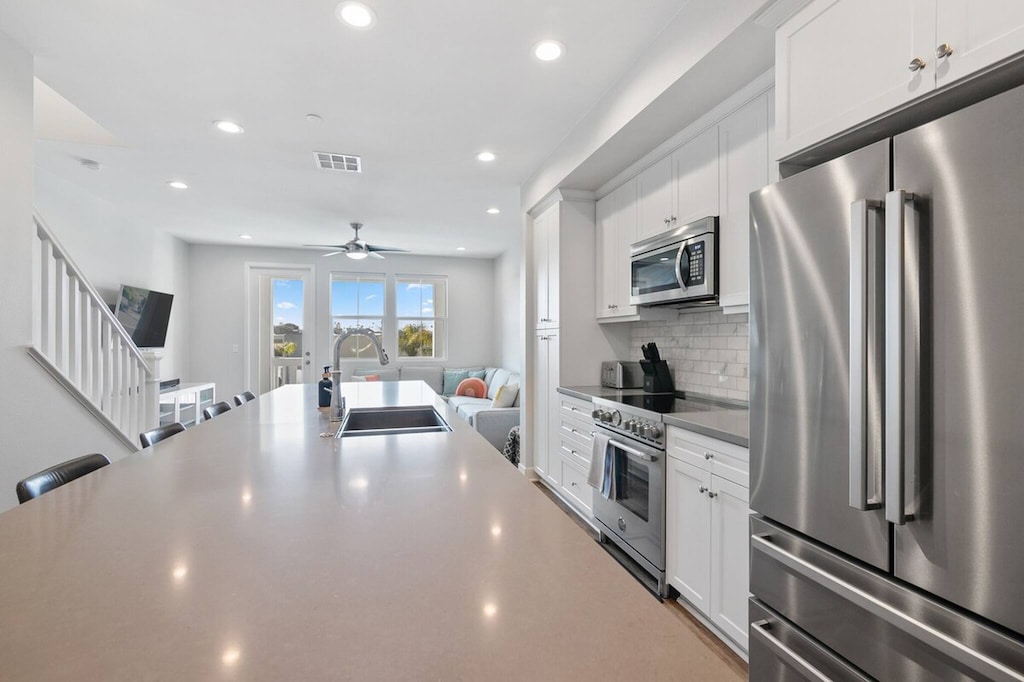 Perfect outside view of neighborhood while cooking and enjoying a meal