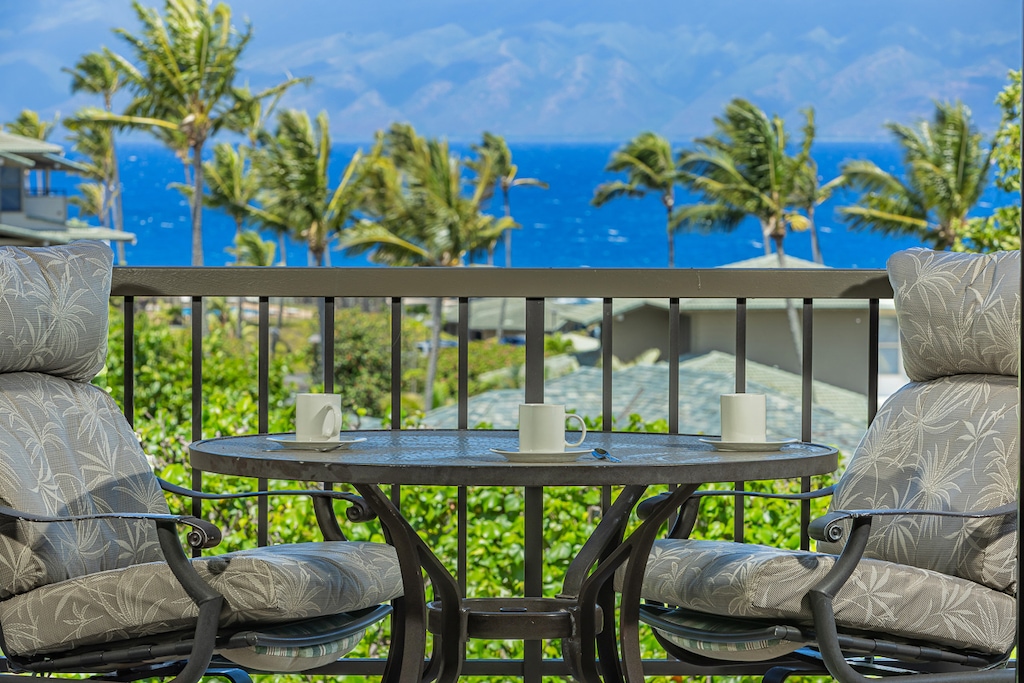 Morning coffee for two with Kapalua’s sparkling sea on the horizon