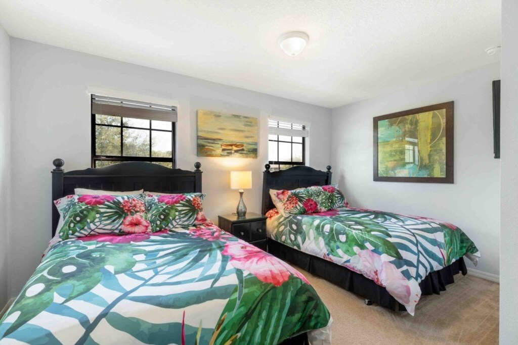 Second floor double full bed suite shares full bathroom in hallway with double twin suite