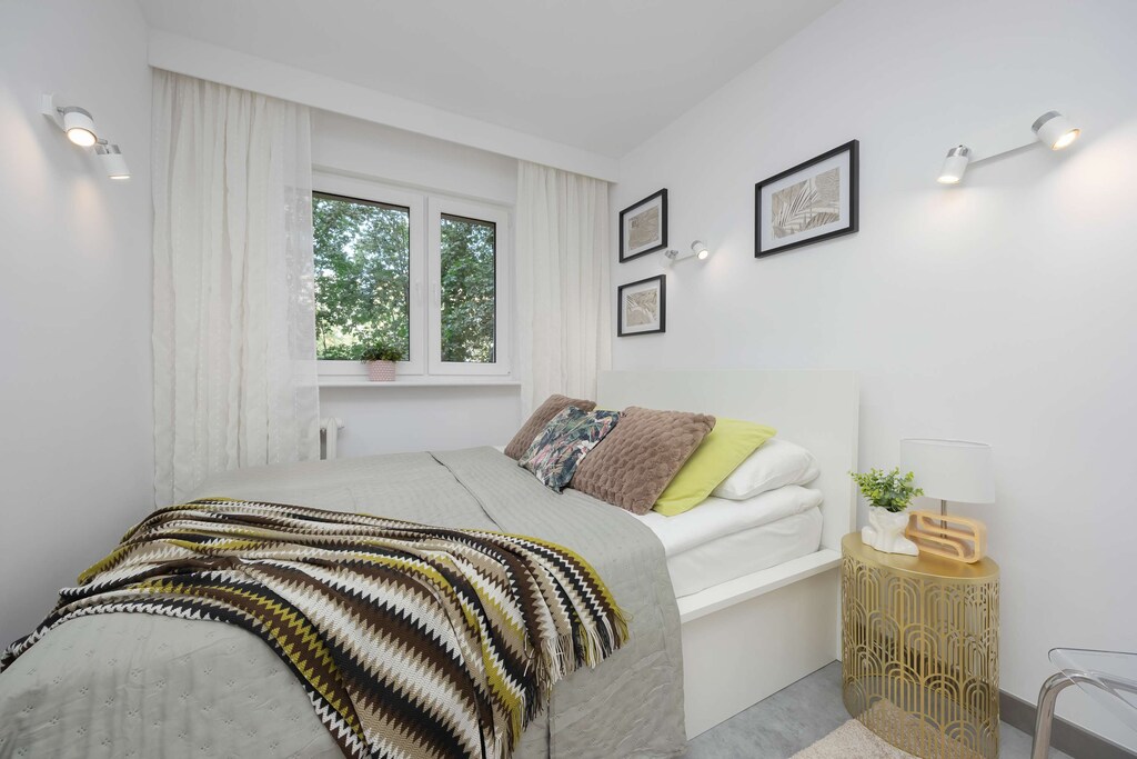 Cozy bedroom in the apartment.