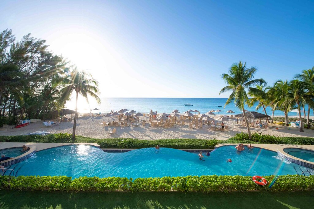 What are you waiting for? Book today and join us under the sun on Seven Mile Beach!