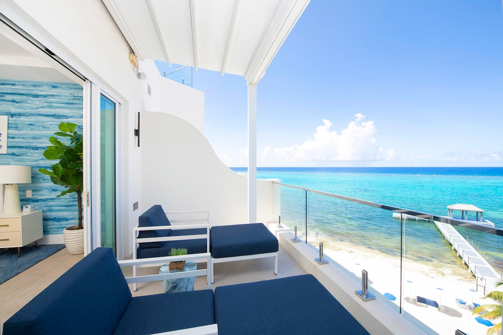 The primary suite also has walk-out access to the balcony.