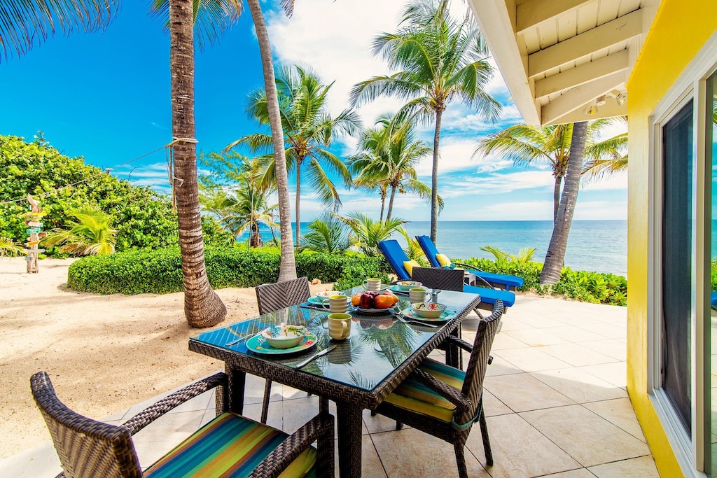 Patio dining table for alfresco meals with stunning ocean views.