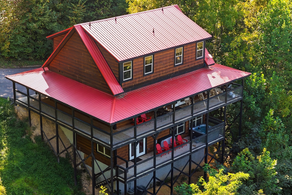 Escape to the mountains. This secluded cabin is nestled among lush greenery, offering the ultimate private retreat.