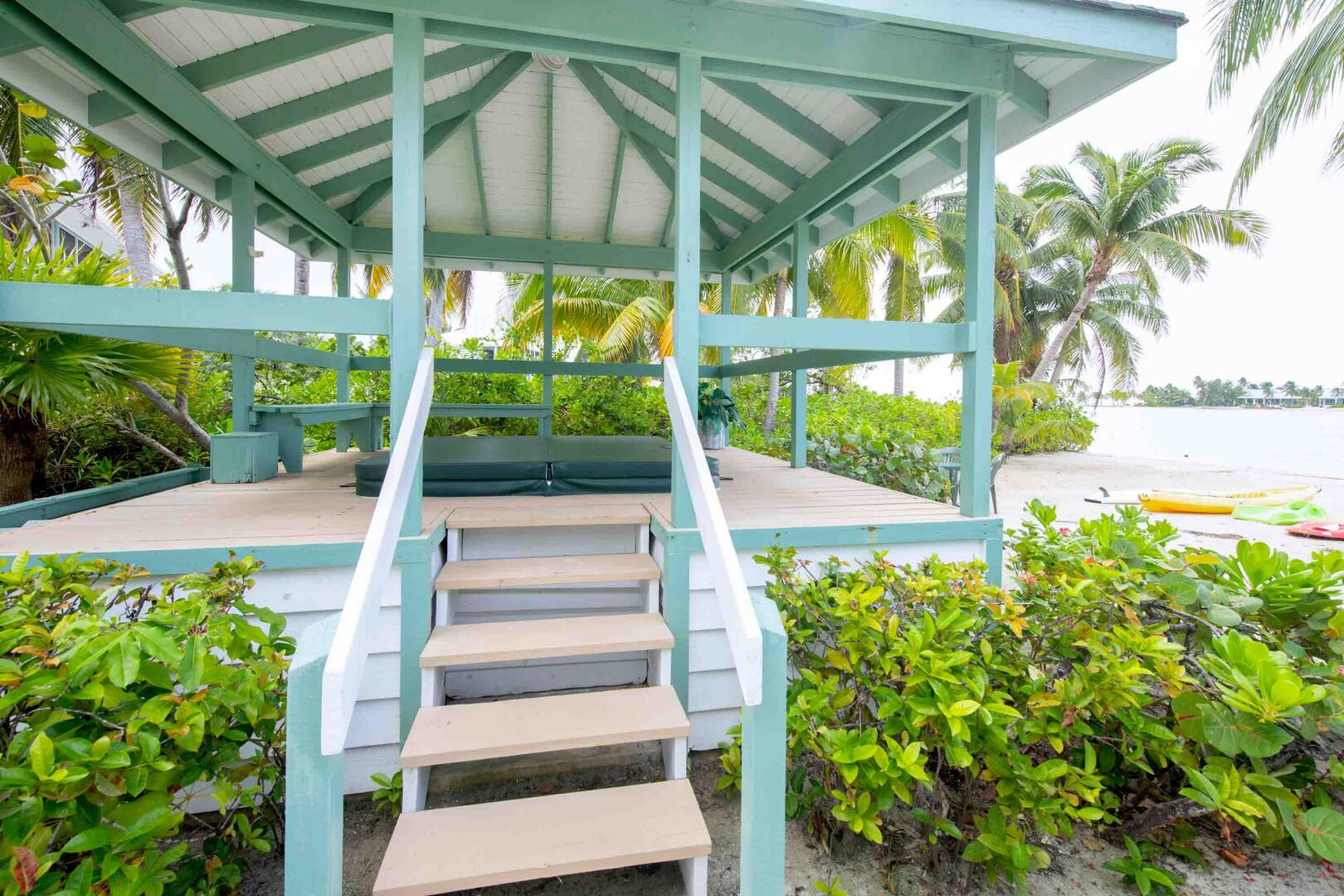 Waterfront gazebo with a built-in spa. Optional spa heat is available for a daily fee.