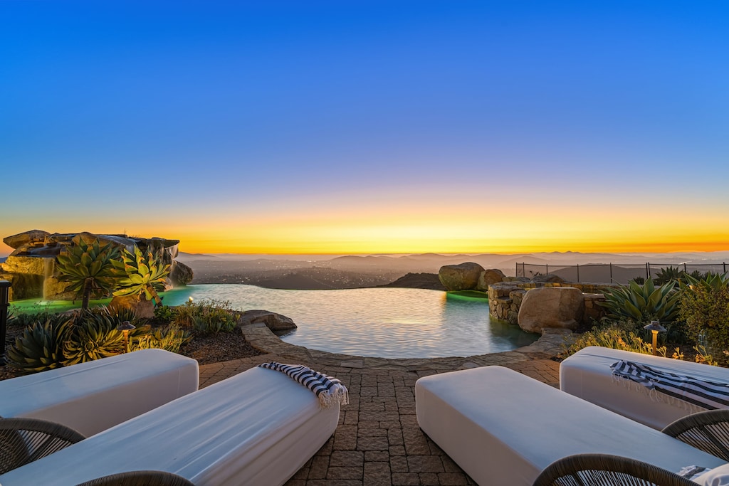 Golden hour over the pool as you look toward the ocean.