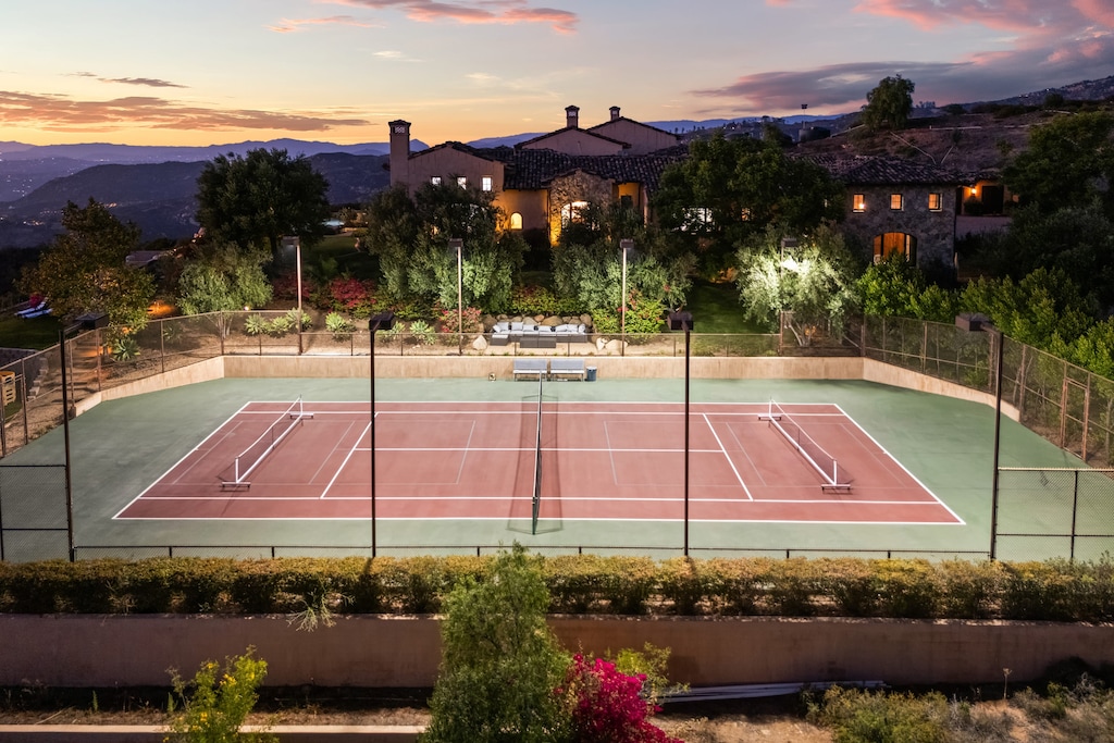 Two pickleball courts and one tennis court with evening lighting to stretch your games into the night.