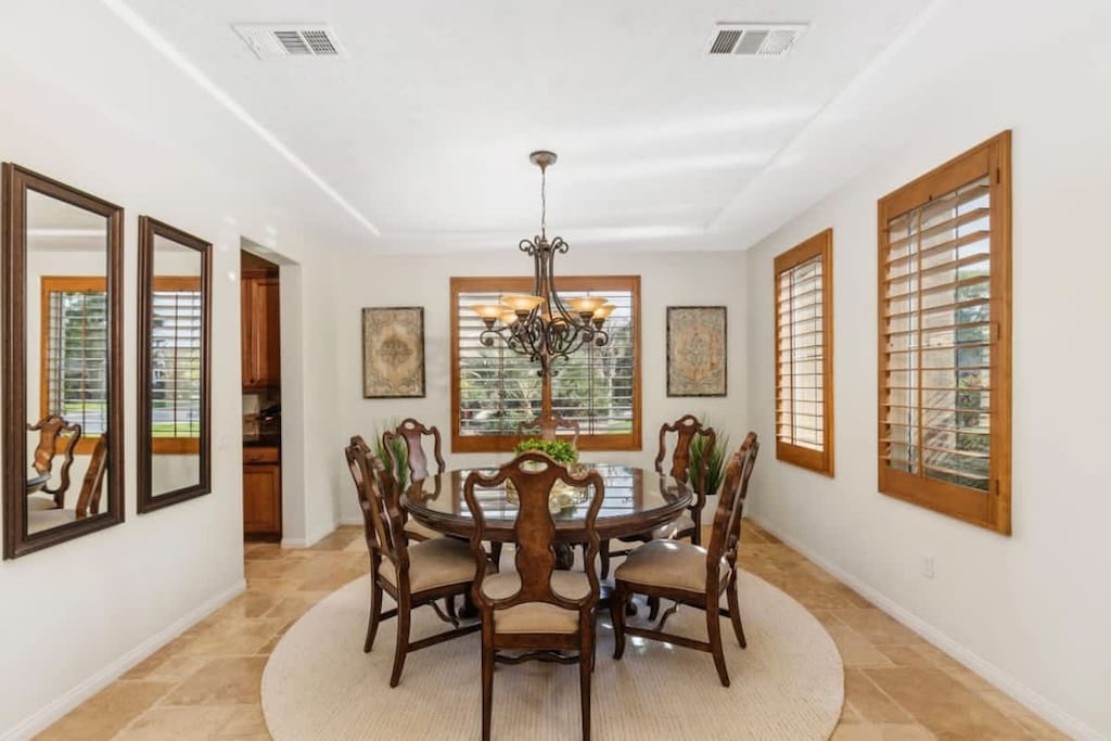 Dine, laugh, and connect in this warm and inviting dining space.