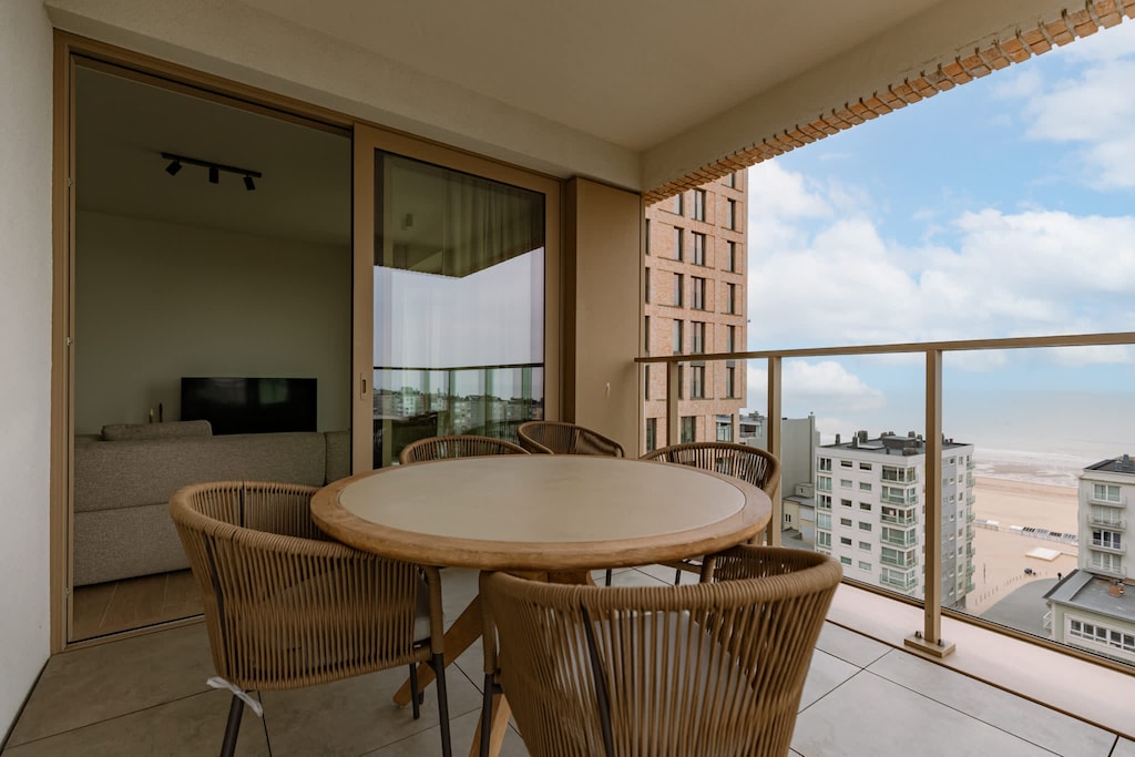 Covered terrace with city panorama, perfect for sunset drinks.