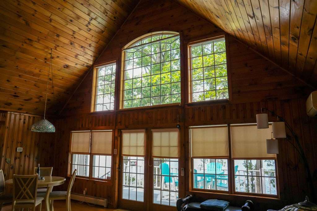 Cozy up with loved ones and enjoy the views in this inviting space.