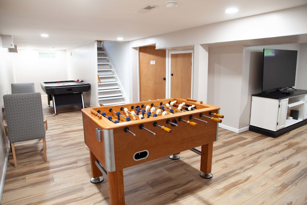 Game Room- Foosball, lounging, and fun for all ages downstairs.