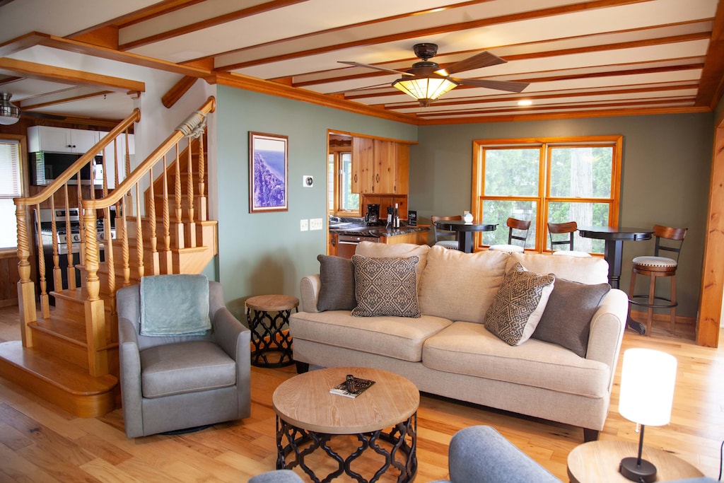 Living Room- Relax in the bright, open gathering space with cozy seating.