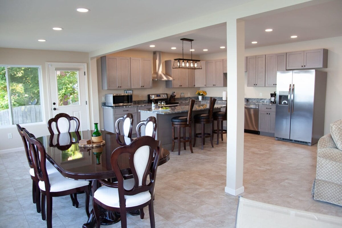 Dining Area- Gather for meals or late-night games around this large dining table. Dining Area- Gather for meals or late-night games around this large dining table.