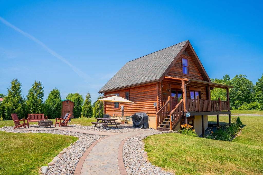  Rustic cabin charm with colorful garden views.