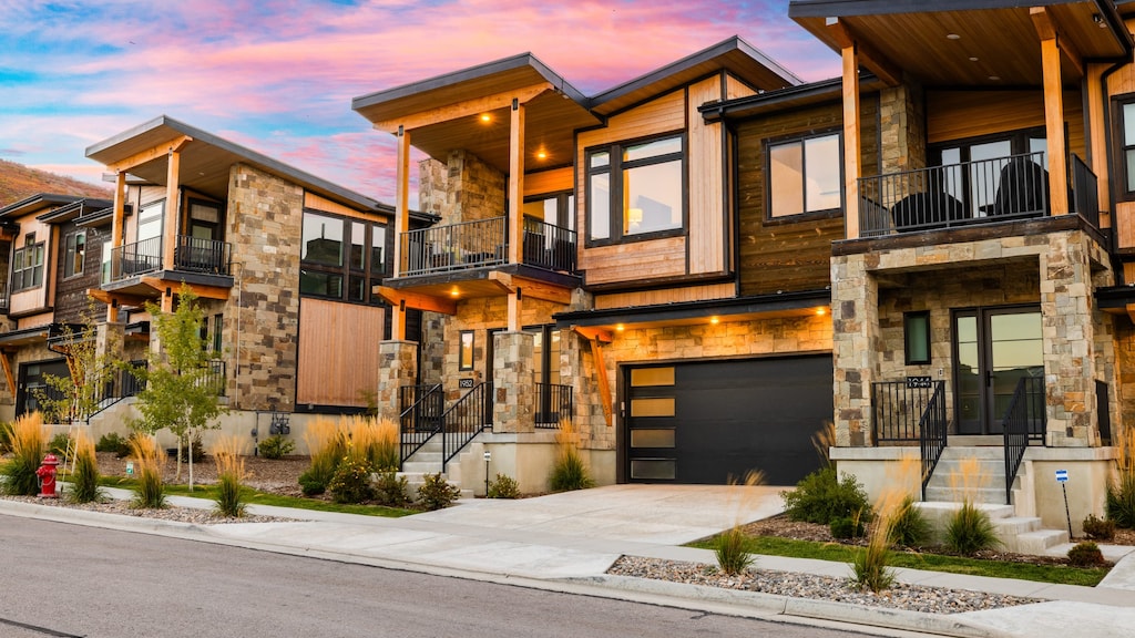 Experience modern mountain living at its finest. This stunning architectural gem welcomes you home under a vibrant Park City sky.