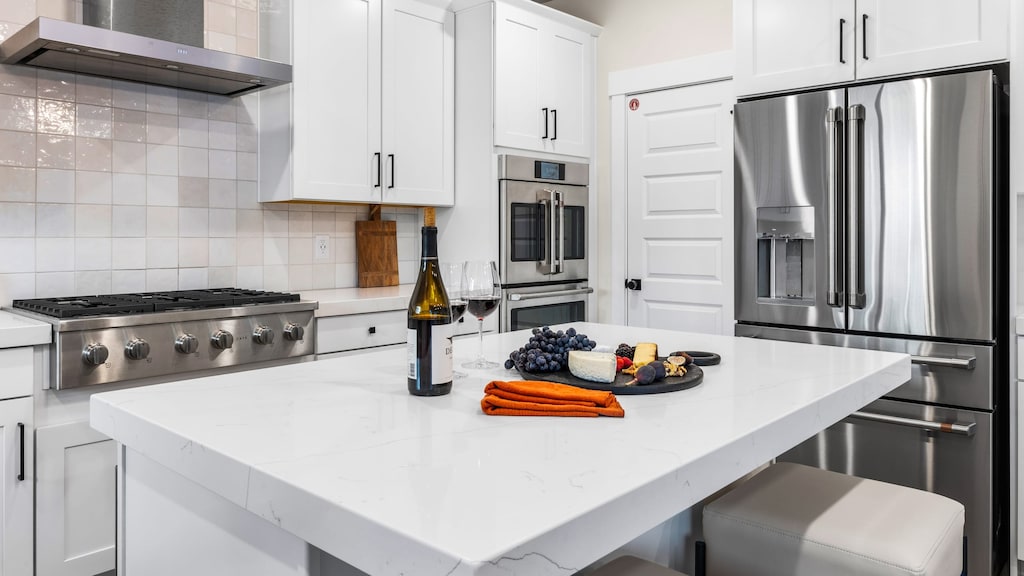 Gather, entertain, and create in this gourmet kitchen.
