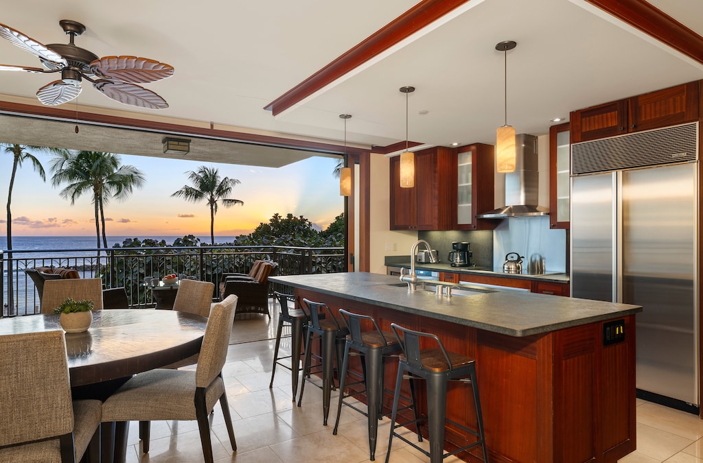 Chef-ready kitchen with Sub-Zero, Wolf appliances, and wine fridge.