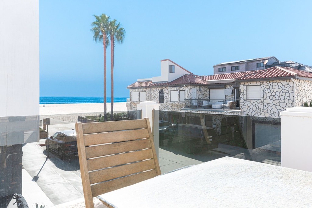 Breathtaking ocean view from the second-floor balcony, accessible from the upstairs living room