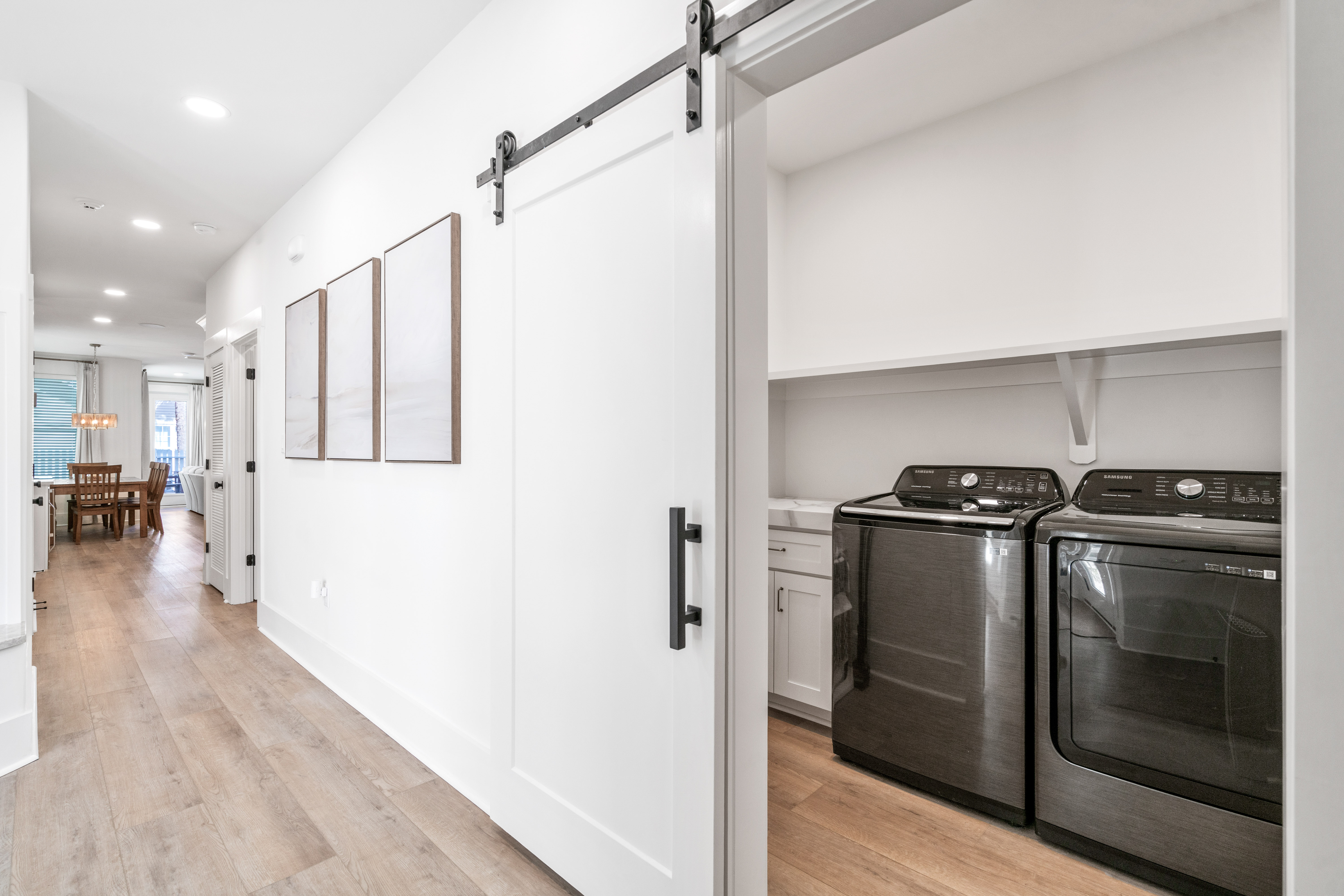 The 1st floor laundry room is located on the right when you enter the home.