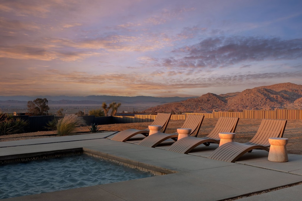Lounge poolside at sunset.