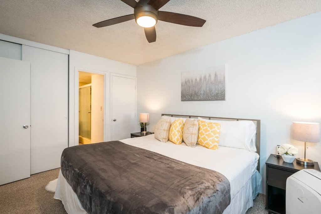 Sleep soundly in our spacious bedroom with a plush king-sized bed and modern decor.